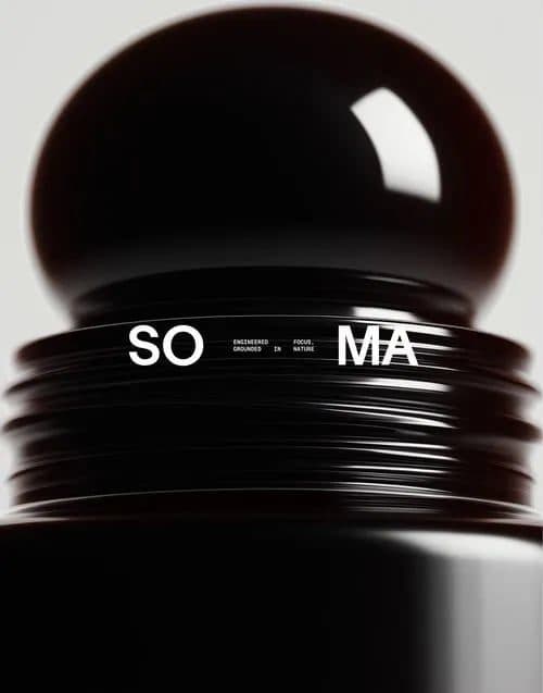 A glossy black sphere on a ribbed black base with the letters SO and MA either side.