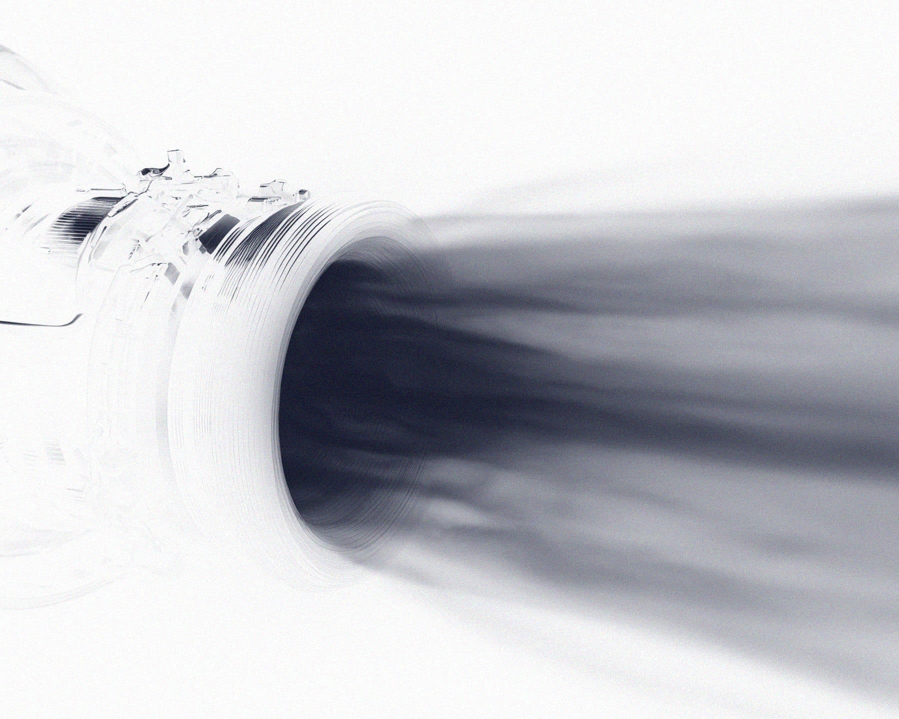 A blurred ink-dark motion streak pulling out of a lens barrel across a white field.